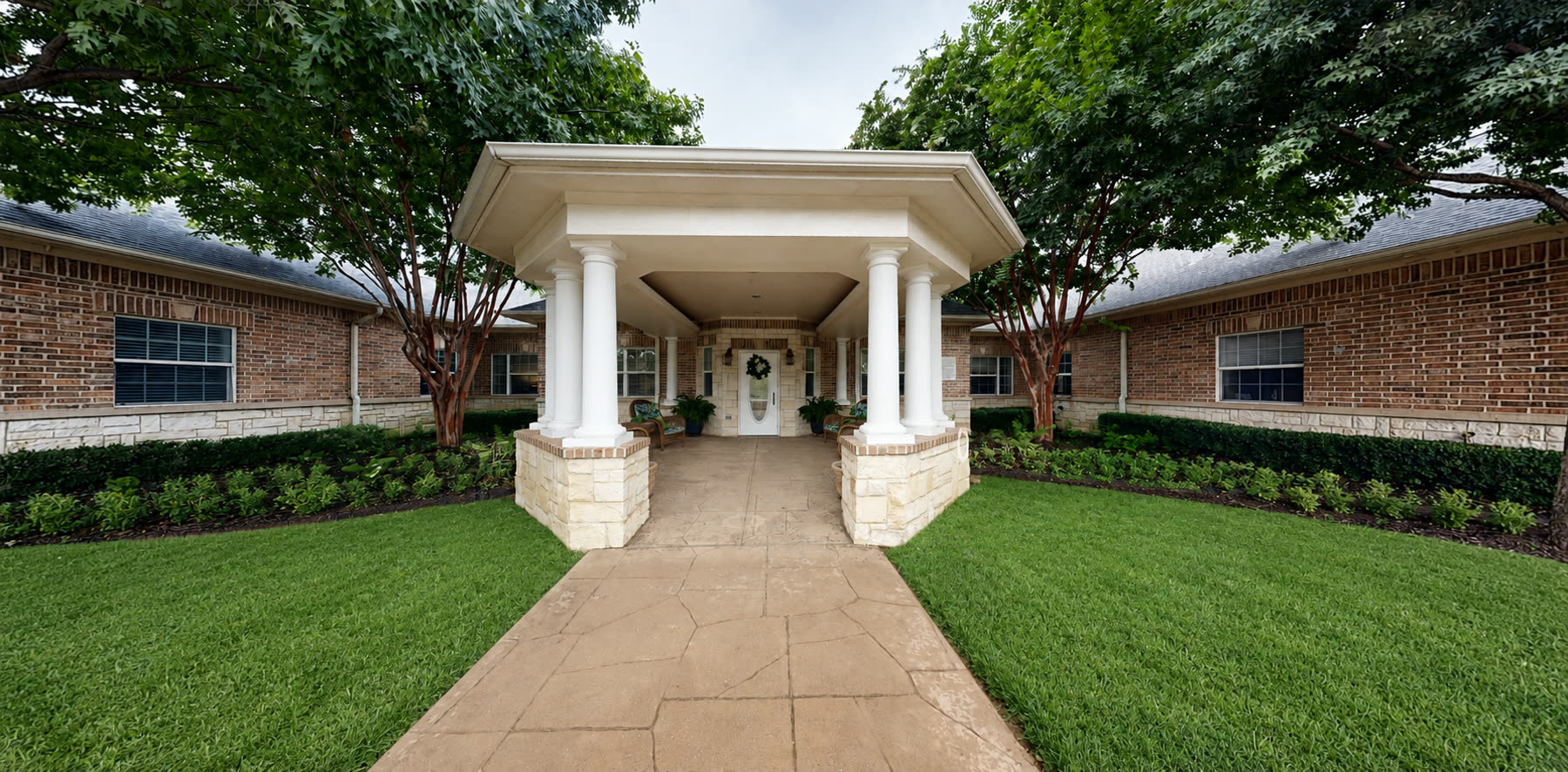 Covered front entrance of Magnolia Memory Care of Flower Mound, 3201 Karnes Rd, Flower Mound, TX
